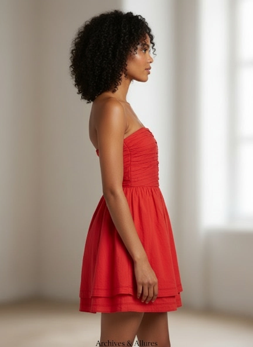 Side profile of the model wearing robe maje bustier soie et coton